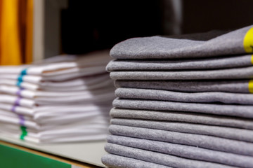stack of clothes in a shopping center