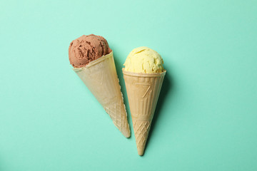 Ice cream in waffles on mint background. Sweet food