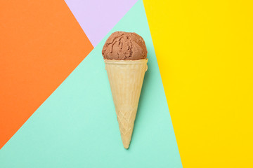 Ice cream on multicolor background, space for text