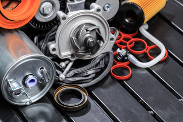 parts for scheduled car maintenance.Oil , air , fuel filter, Water pumps motor, belt car engine  ...