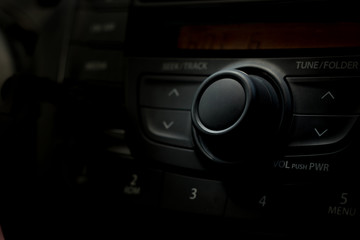 Car audio control buttons for controlling the audio system