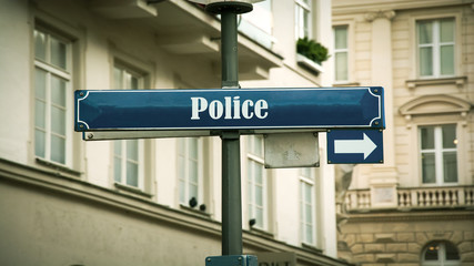 Street Sign to Police