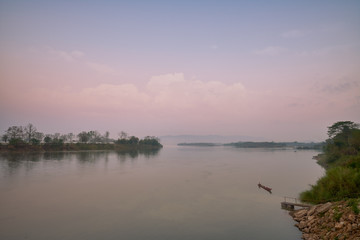 Fototapeta na wymiar morning skyline and fog in khong river from chiang san of chiang rai thailand