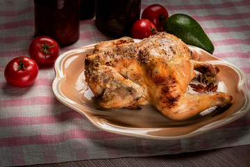 Roasted chicken with crisp on a plate