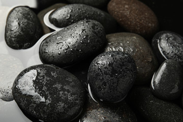 Pile of stones in water as background, closeup. Zen lifestyle