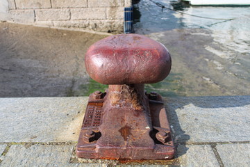 A fire hydrant on the side of a building