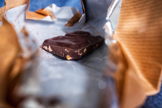 The Last Piece Of Chocolate With Hazelnuts Inside Of The Package