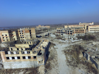 Fototapeta premium Abandoned construction site of Hospital. (aerial drone image)Abandoned at 1991,during Ukrainian undependence crisis. Kiev Region,Ukraine