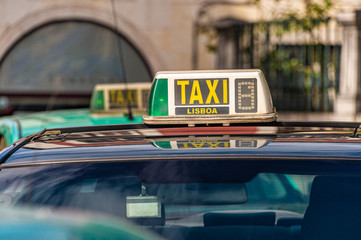 Taxi sign on a car in Lisbon