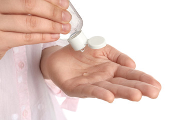 Woman applying sanitizer gel on white background, closeup