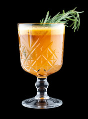 Hot drink with sea buckthorn and rosemary. On dark background