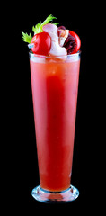 Bloody Mary cocktails, with tomato juice and vodka, cherry tomatoes and basturma. On dark background