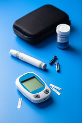 glucometer ketometer lancet and strips for self-monitoring of blood glucose or ketones level. diabetes or keto diet