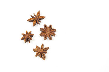 four stars of Badian in the left part of the image on a white background close up view from above