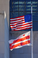 Flags of Washington DC and the United States floating side by side