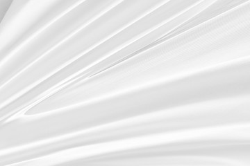 Obraz premium Clean textile woven beautiful soft fabric abstract smooth curve shape decorative fashion white background