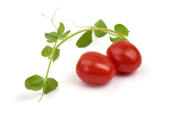 Fresh Cherry Tomatoes with young green peas, isolated on white background