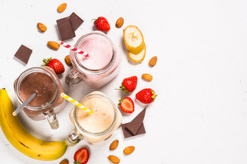 Set of milkshakes in mason jars.
