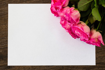 card with roses on white background