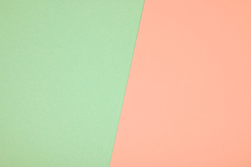 Two tone of peach and palegreen paper background. Trend colors concept.