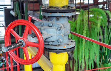 Fototapeta na wymiar Gas shut-off valve at gas processing station.