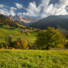 Scenic view of Green valley Santa Maddalena village, Val di Funes, Dolomites Mountains, Italy