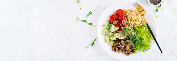 Trendy salad. Vegan Buddha bowl with lentil, avocado, mushrooms, lettuce, tomatoes and chia seeds. International Day Without Meat. Vegetarian salad. Top view, overhead, banner