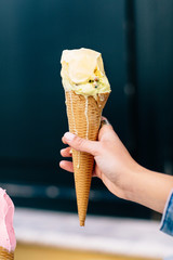 Detail of a holding an ice cream cone