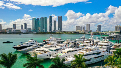 Aerial Photography of Luxury Boats and Buildings in the Background - obrazy, fototapety, plakaty