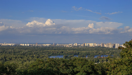 Lake in the forest near a large metropolis