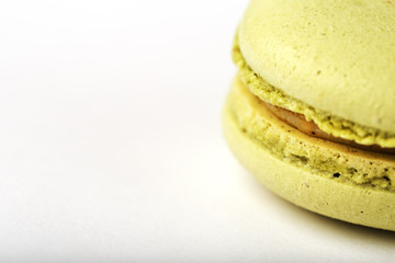 Green macaroni Cookies on a white background, isolated.