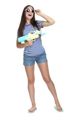 Obraz na płótnie Canvas Young girl with water gun isolated on white background