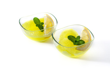 Lemon sorbet with mint in glasses isolated on white background