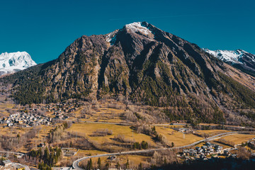 The village Palleusieux under a big mountain, in the Basin Pre-Saint-Didier, Aosta Valley at the time of corona virus outbreak, northern Italy