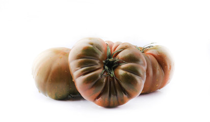 Black prince variety tomatoes isolated on white background