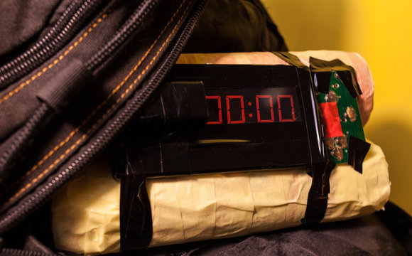 homemade bomb with a detonator in a black bag