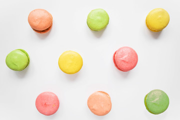 Sweet french colorful macaroons isolated on white background.