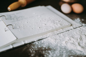 cook book with flour