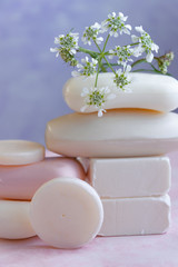 Obraz na płótnie Canvas Handmade soaps with wild flowers extract. Hygiene, artisanal products