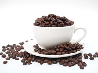 coffee bean in coffee cup on white background