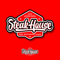 Steak house logo. Butchery or restaurant logo. Calligraphic composition with stars. Vintage American style.