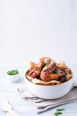 Sticky sesme and onion chicken wings
