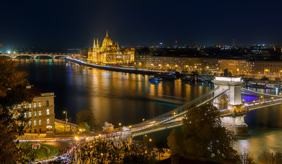 Fototapeta na wymiar Colorful evening cityscape. Fantastic Night panoramic view at Budapest. Hungarian landmarks, Parliament and Chain Bridge, Popular Travel destinations. popular plases for photographers.