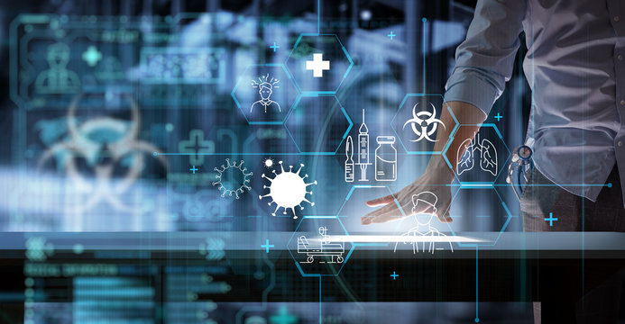 Medical science doctor working with modern computer in the laboratory with a biological AR for analysis and sampling of Covid-19 infectious disease.