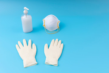 White latex gloves,sanitizing gel and mask. Protection concept. Protection against pollution,...