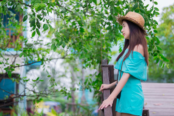 Portrait of beautiful asian chic girl pose for take a picture,Lifestyle of teen thailand people,Modern woman happy concept,Traveler walking on weekends.