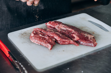cook sliced and salted meat for steaks