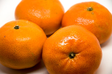 Fresh tangerines - top views