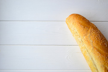 Crusty French Baguette on a white table