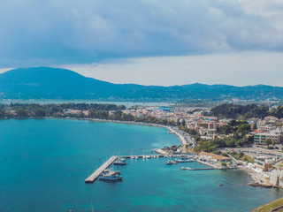 Greece, Corfu island.  A beach with crystal clear azure water and a white beach in picturesque landscapes - the paradise coastline of the island of Corfu in Paleokastritsa, Ionian archipelago